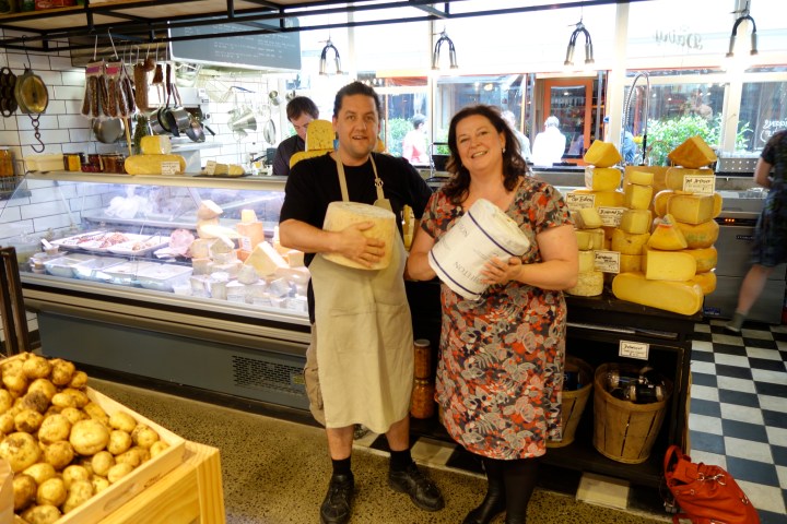 Lucy and Curd Nerd holding cheeses